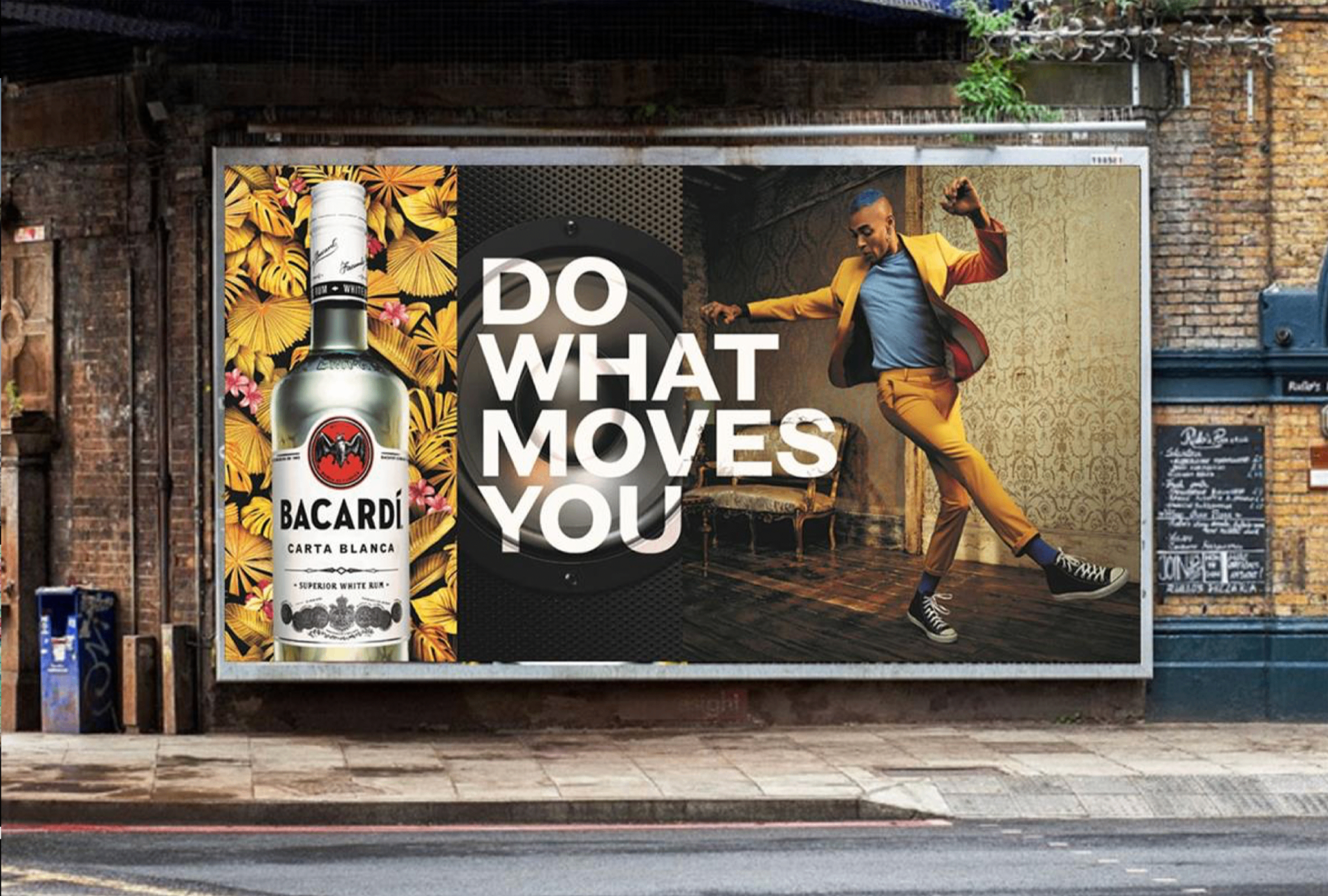 Bacardi Do What Moves You billboard with tropical bottle and dancer